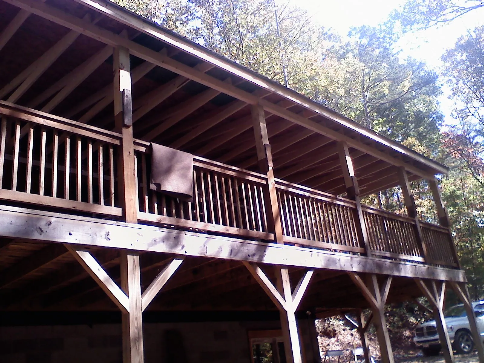 Timber framing under a new elevated porch and deck — Roof Leak Repair in Port Penn by Roofing Brothers